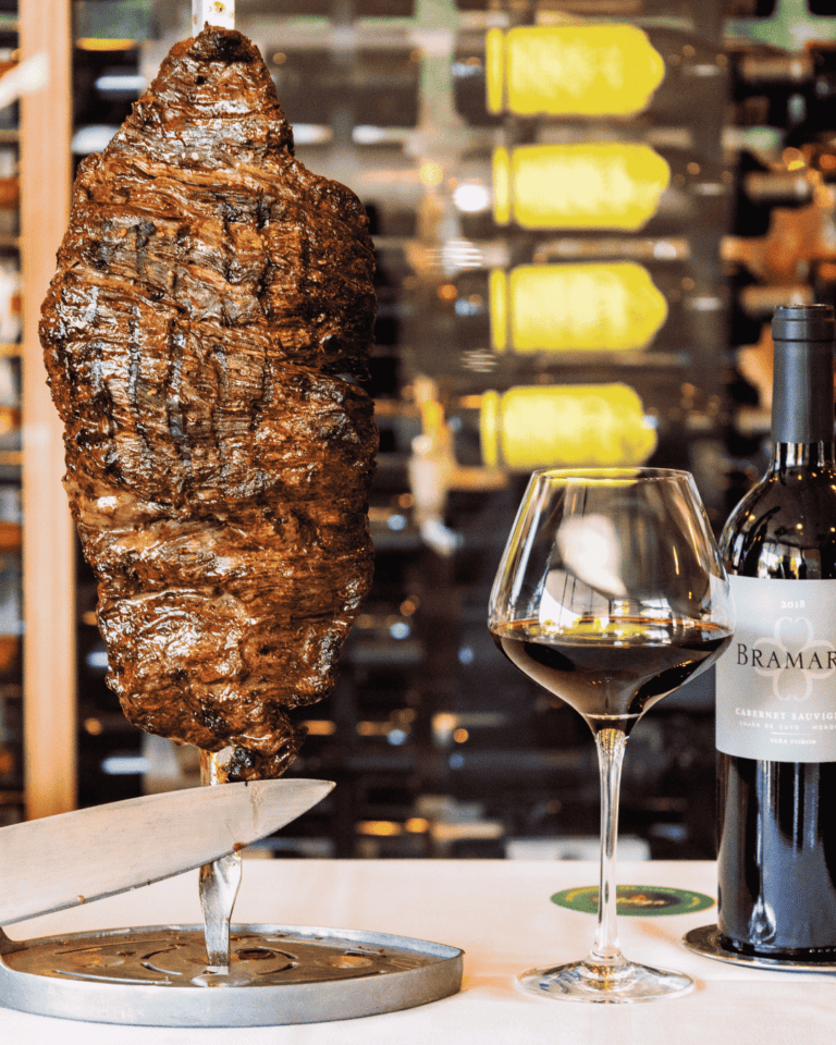 Easter at Adega Gaucha Brazilian steakhouse featuring Full Churrasco Experience and chocolate fountain available all Sunday in an elegant Florida dining setting