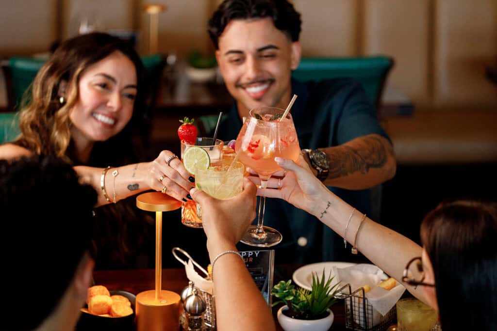 This image shows guests enjoying World Cup coverage at Adega Gaucha Orlando.