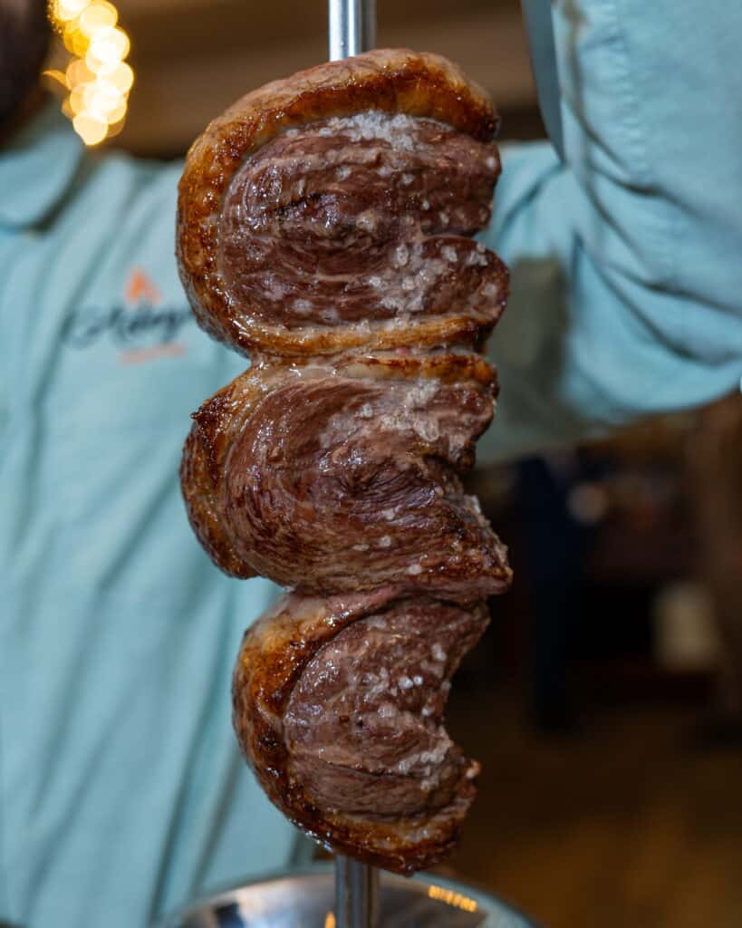 Picanha is celebrated for its bold beef flavor, signature fat cap, and a connection to Brazilian churrasco culture.