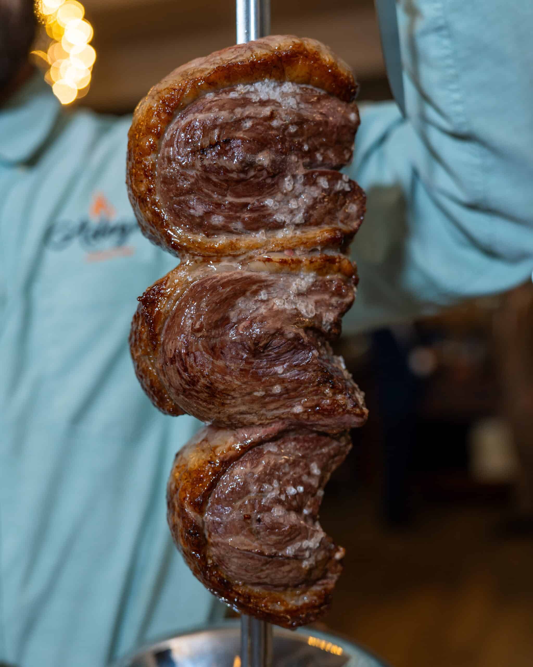 Picanha is celebrated for its bold beef flavor, signature fat cap, and a connection to Brazilian churrasco culture.