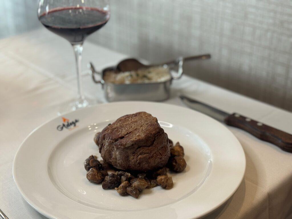 Halal Filet Mignon at Brazilian Steakhouse Adega Gaucha, and served in a plate.