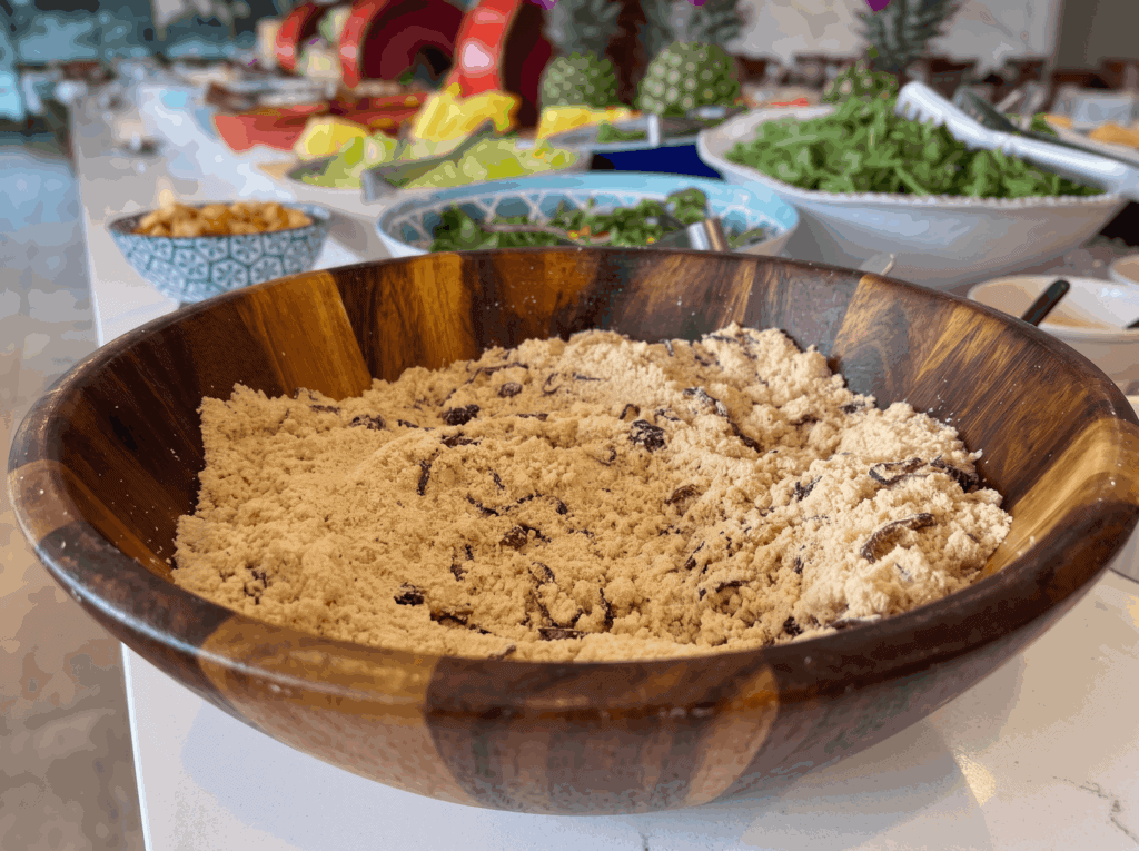 toasted cassava flour - Brazilian side dish served at Adega Gaucha.