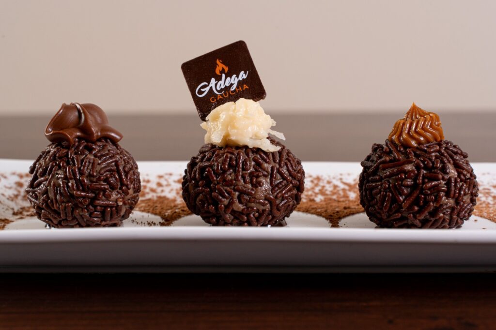 Brigadeiro Trio topped with Nutella, coconut and dulce de leche, a classic Brazilian desserts at Adega Gaucha