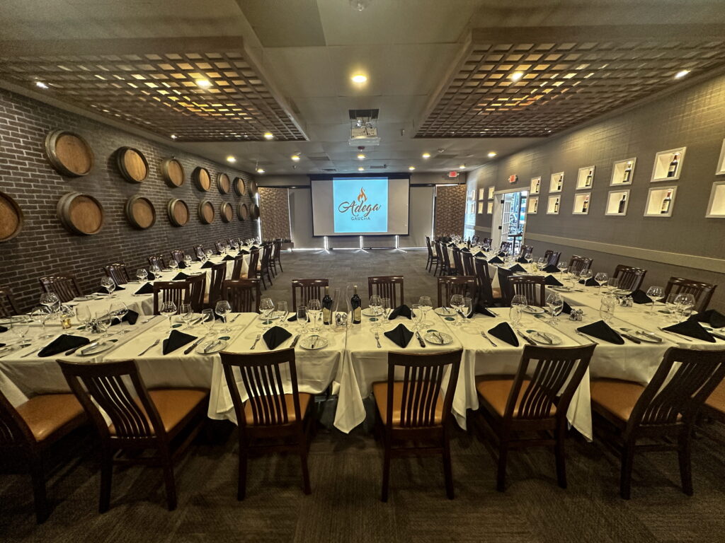 Long group table; private dining in Orlando, FL, set for an event room.